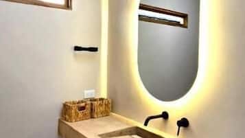 Shower, towels, soap, toilet paper