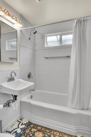 Hair dryer, towels, soap, toilet paper