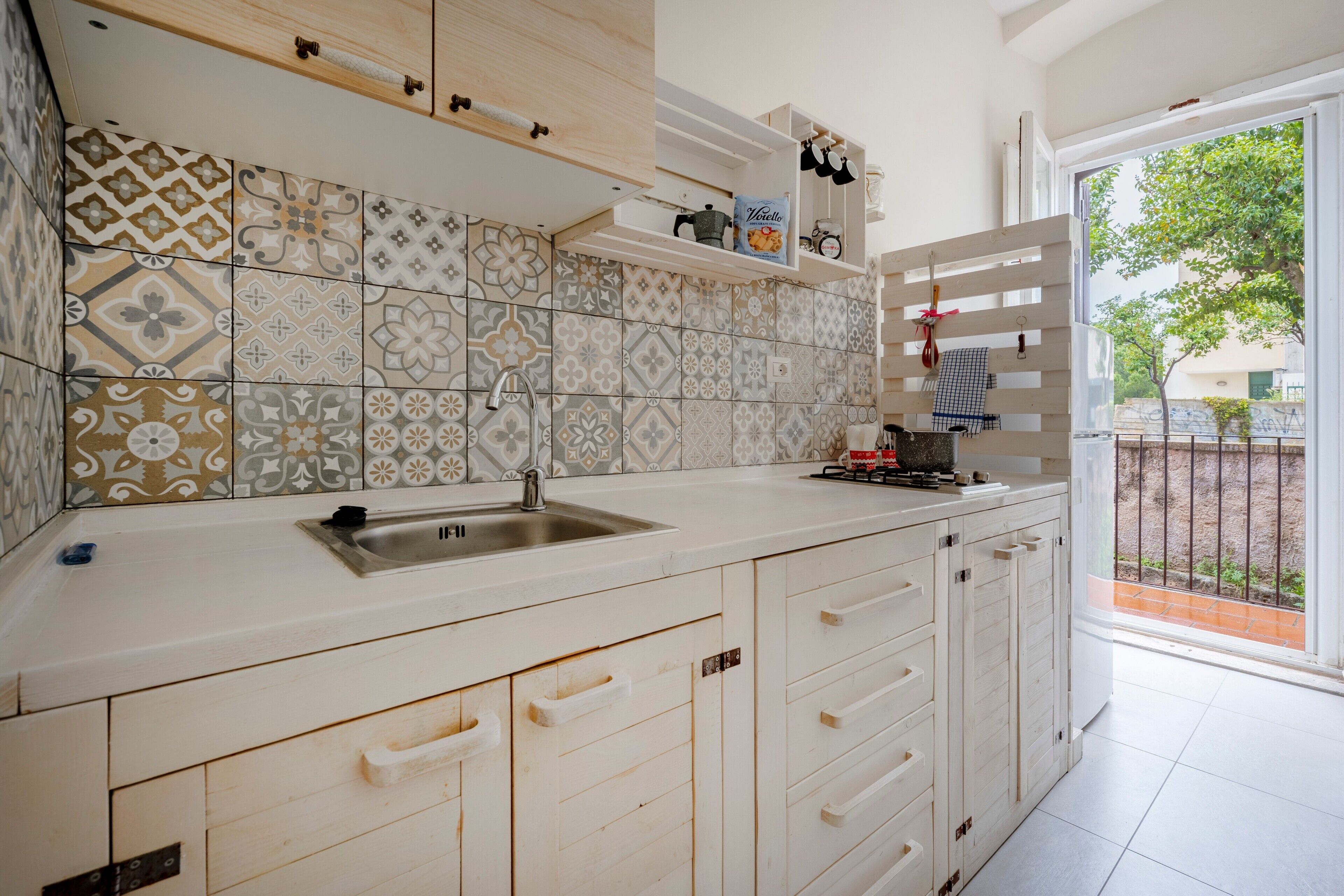 Fridge, stovetop, cookware/dishes/utensils, spices