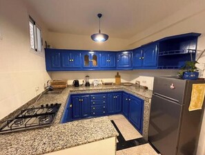 Private kitchen - Duplex with Panoramic Terrace - 180° Sea View in Tamraght (Tamraght)