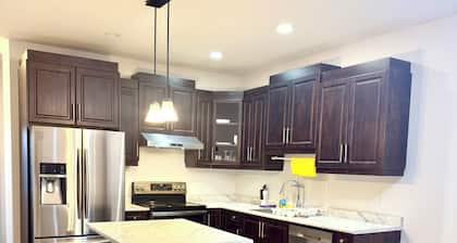 Peaceful Family Home | 4BR, Huge Deck, Garage & Free Wi-Fi