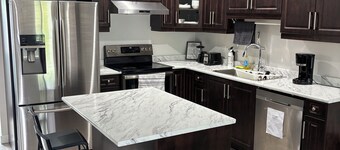 Peaceful Family Home | 4BR, Huge Deck, Garage & Free Wi-Fi