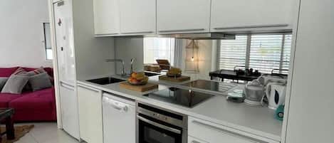 Fridge, dishwasher, toaster, cookware/dishes/utensils