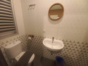 Habitación doble Deluxe | Baño | Regadera 