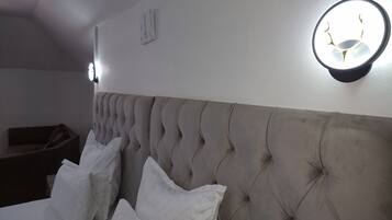 Deluxe Quadruple Room, Courtyard View | Desk, laptop workspace, iron/ironing board, free WiFi