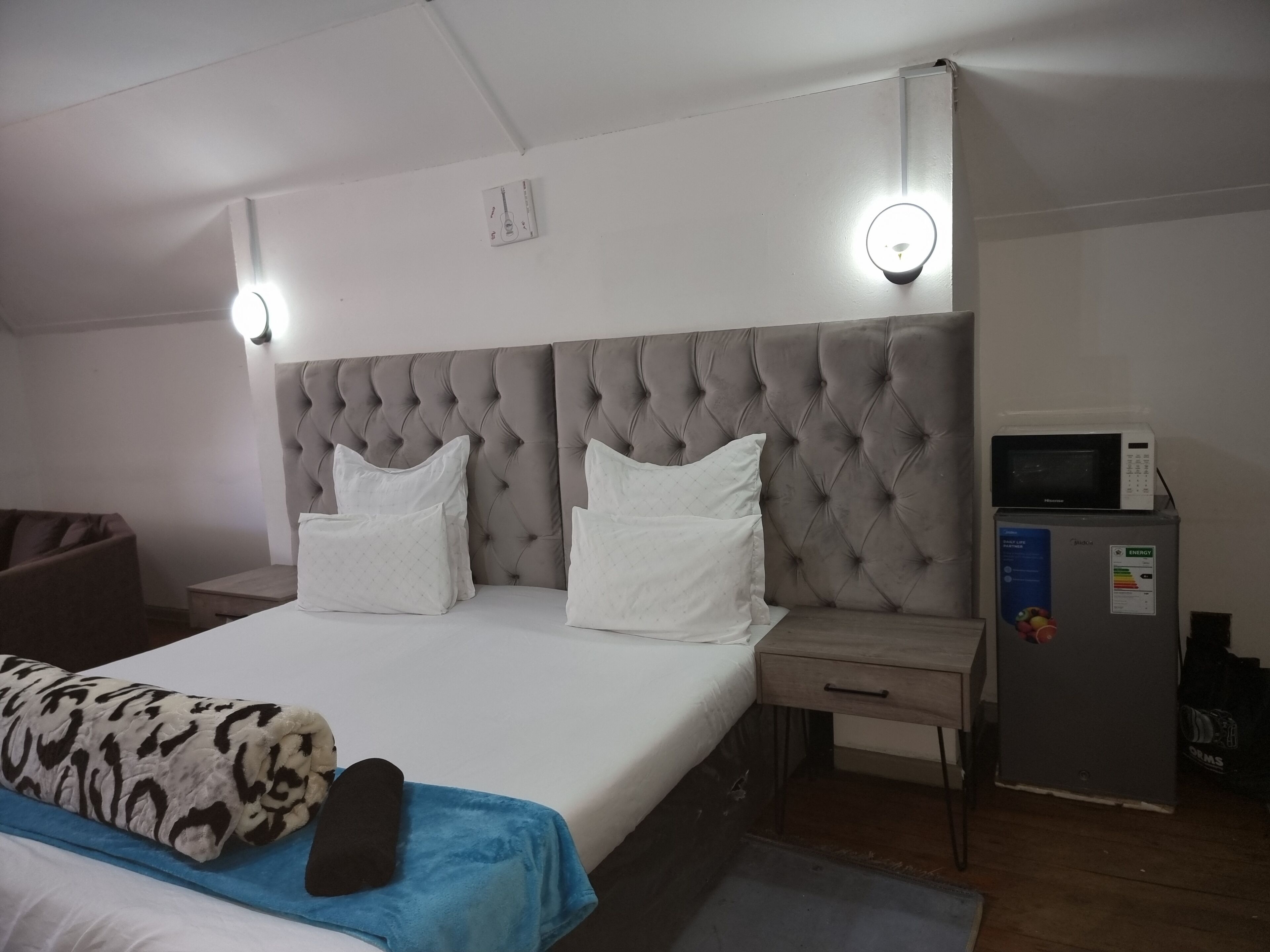 Deluxe Quadruple Room, Courtyard View | Desk, laptop workspace, iron/ironing board, free WiFi