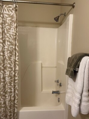 Hair dryer, towels, soap, toilet paper