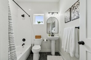 Hair dryer, towels, soap, toilet paper