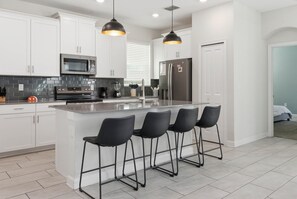 Fridge, microwave, oven, stovetop - 5BR Family Home, Pool, Theme Beds, Space, Location (Kissimmee)
