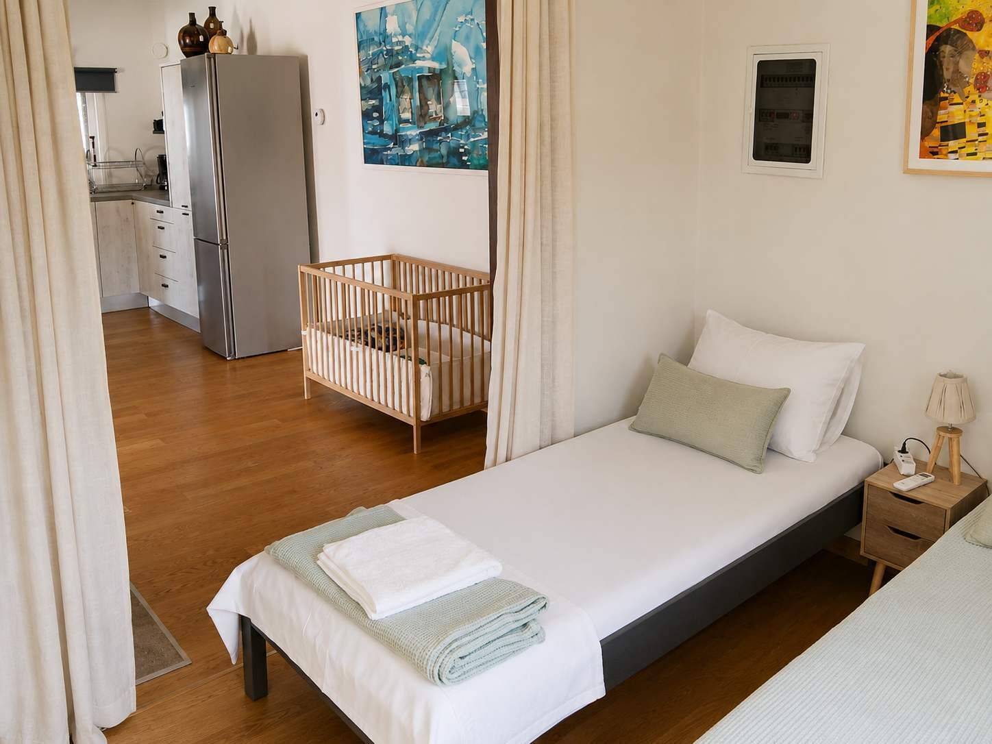 2 bedrooms, desk, iron/ironing board, travel crib