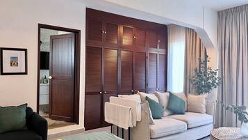 Superior Suite, Pool View | In-room safe, desk, laptop workspace, blackout curtains