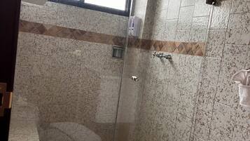 Superior Suite, Pool View | Bathroom | Shower, towels, soap, shampoo