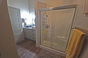 Shower, towels, soap, toilet paper