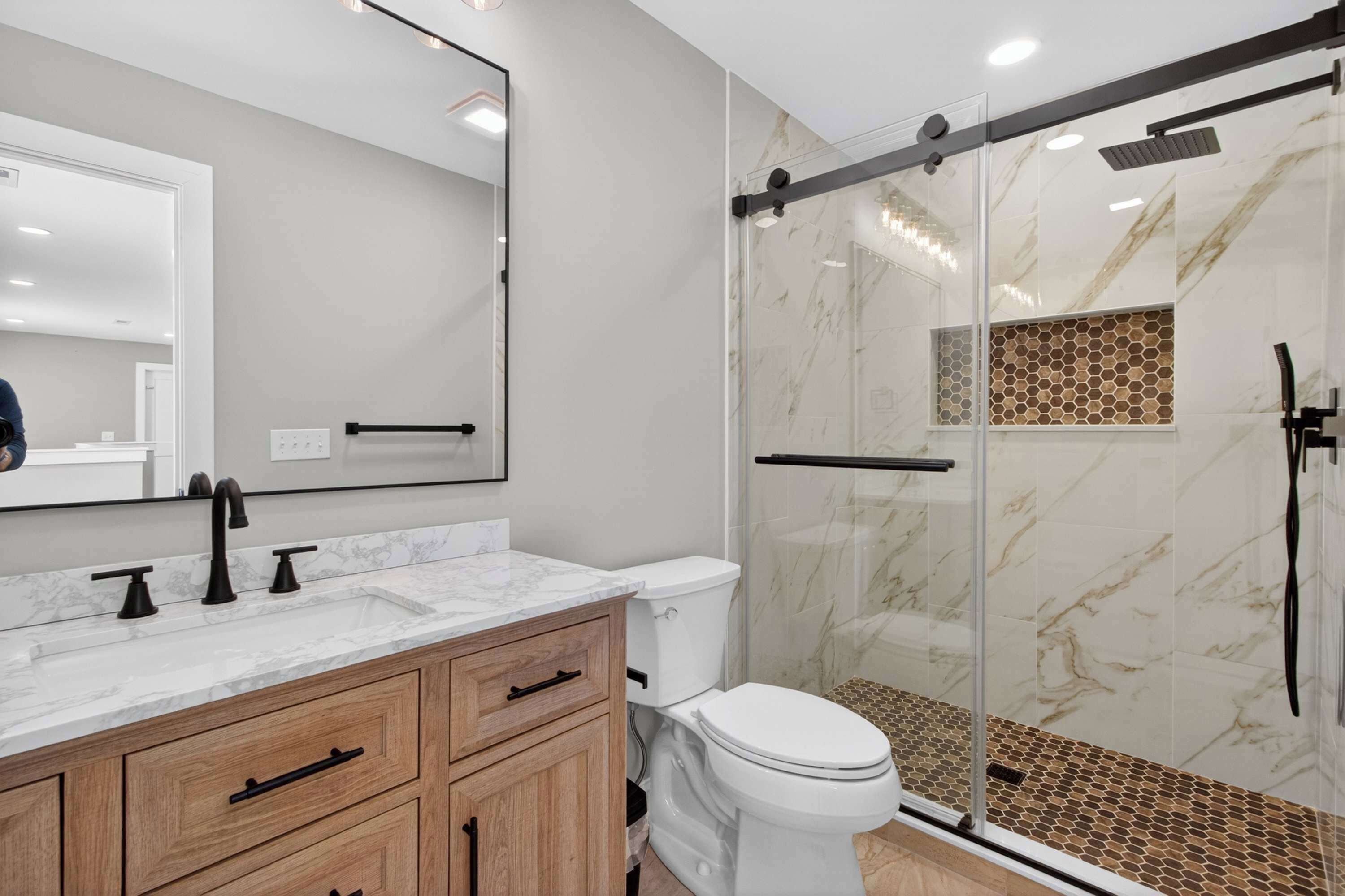 Shower, hair dryer, towels, shampoo