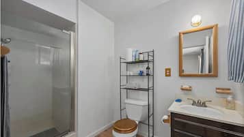 Shower, towels, soap, toilet paper