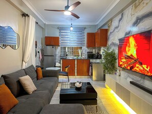 Living area - BARKSDALE Homes Bukoto with KING SIZE BED AC. DSTV. NETFLIX. STANDBY GENERATOR (Kampala)