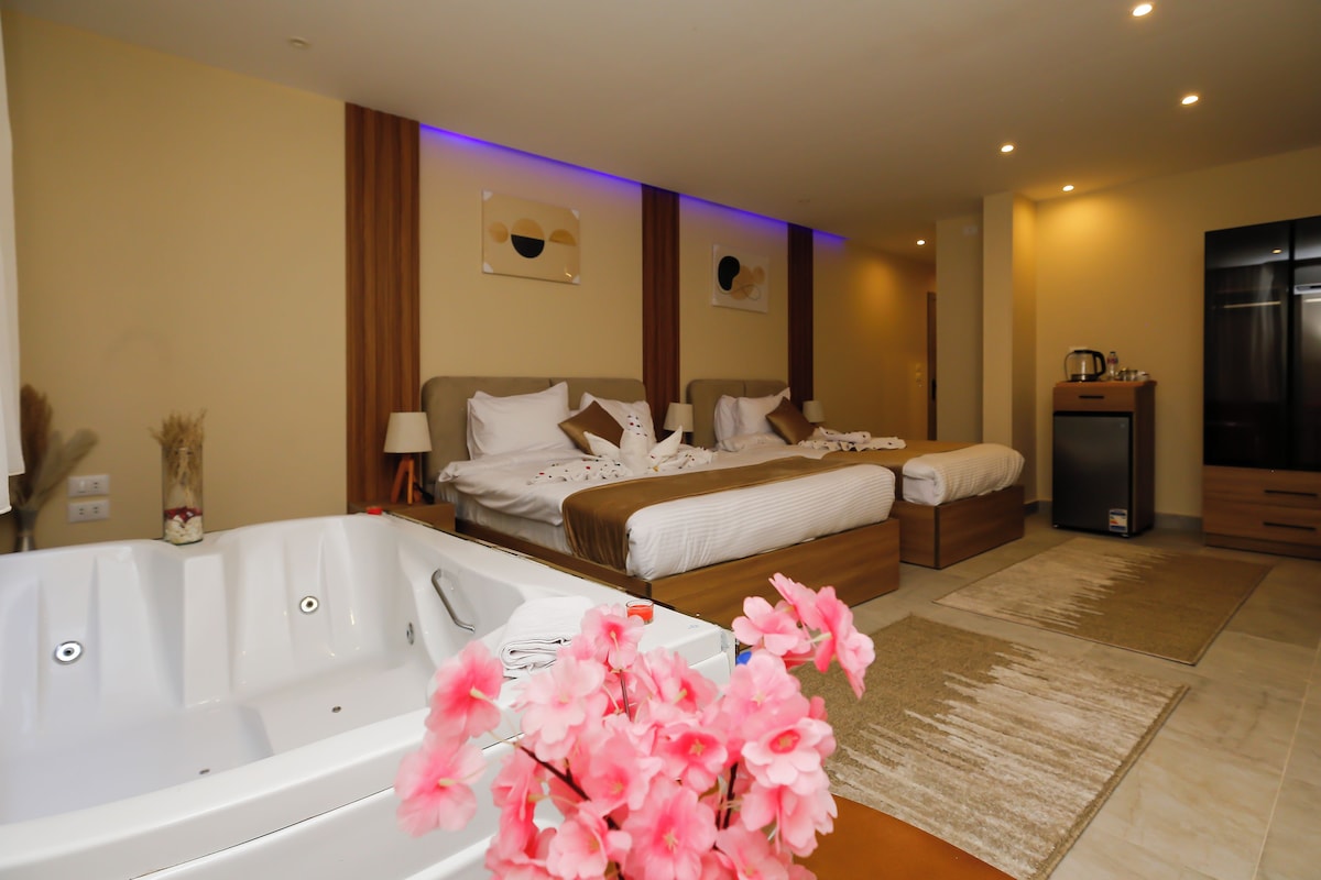 Luxury Triple Room, Hot Tub, Mountain View | Egyptian cotton sheets, premium bedding, memory foam beds, minibar