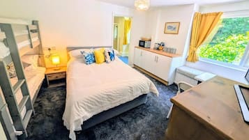 Family Room, Garden View | Desk, laptop workspace, free WiFi