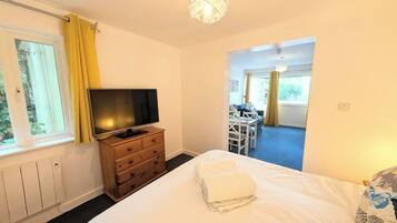 Superior Studio Suite, Courtyard View | Living area | 40-inch Smart TV with digital channels, streaming services