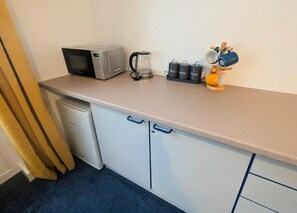 Suite Studio Supérieure, vue cour intérieure | Cuisine privée
