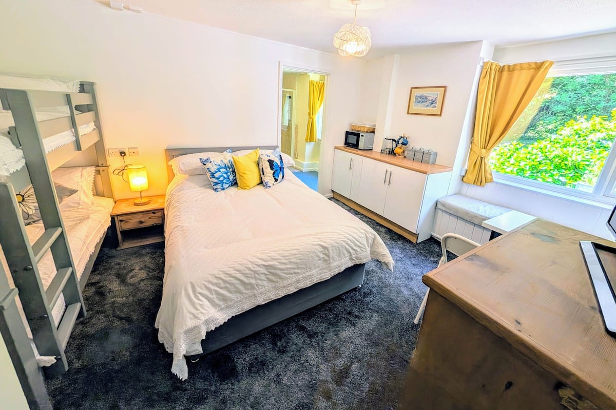 Family Room | Egyptian cotton sheets, premium bedding, individually decorated