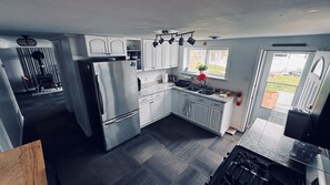 Fridge, microwave, oven, stovetop - Charming 2-bedroom lake front Cottage.  Sleeps 9 in Remus, West of Mt Pleasant (Remus)