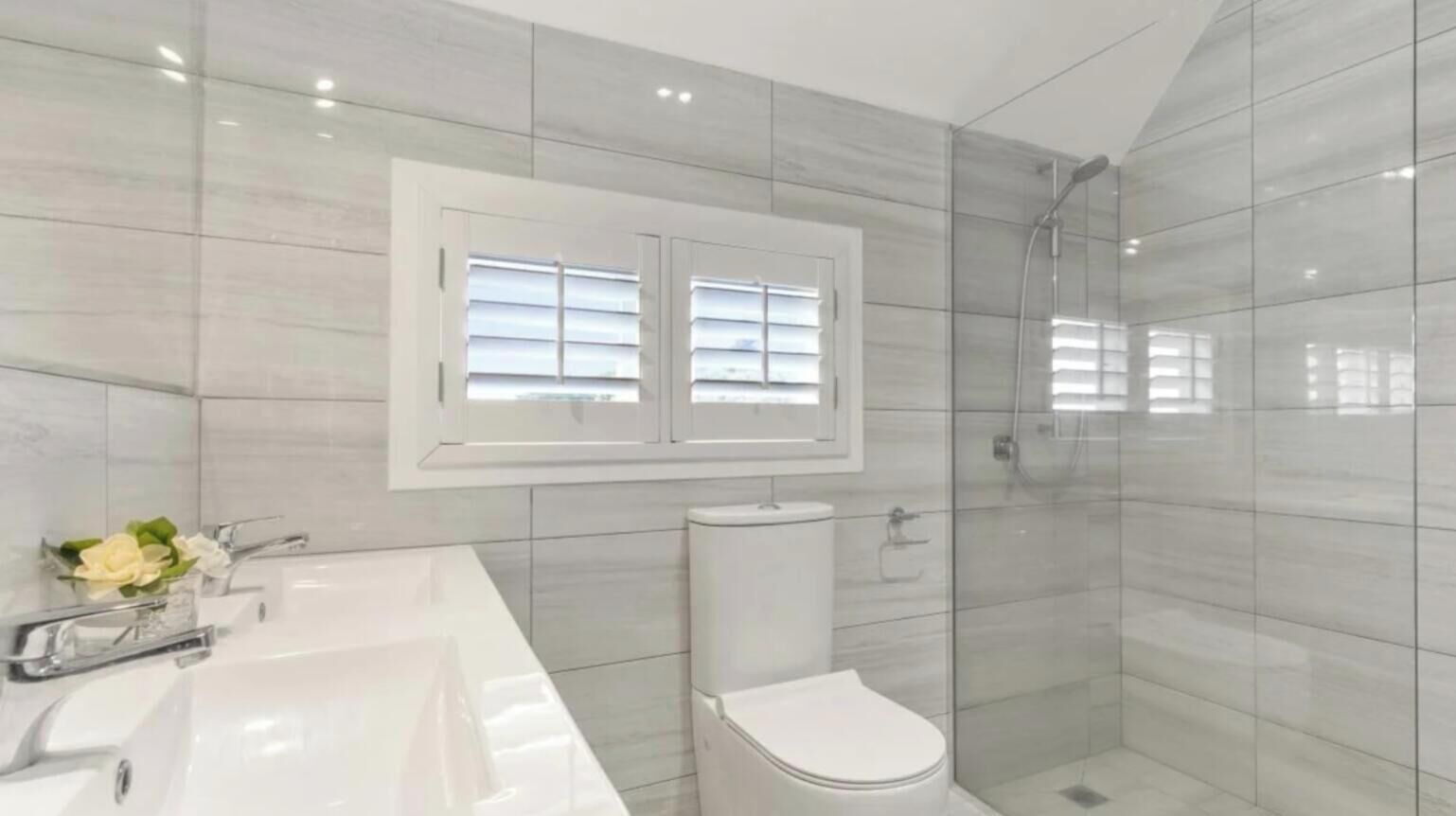 Shower, hair dryer, towels, toilet paper