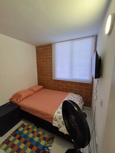Quiet and bright apartment located in Ibague, swimming pool and parking.