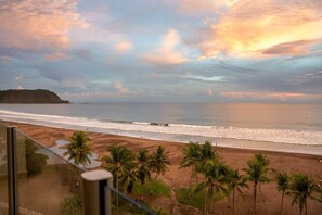 On the beach, beach towels - Diamante 701s - Downtown Beachfront Luxury Condo (Jaco)
