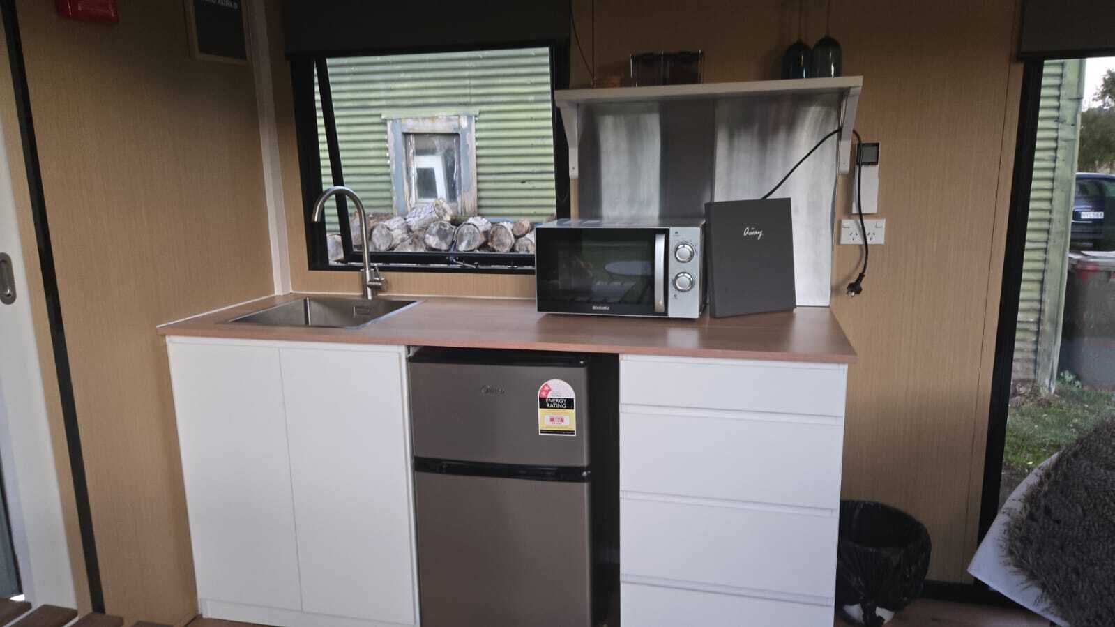 Fridge, microwave, stovetop, coffee/tea maker