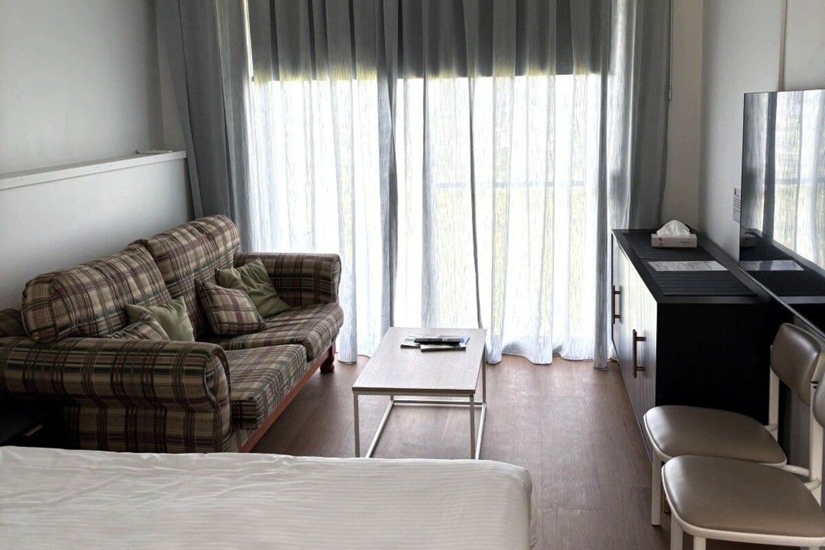 Suíte família, vista para o lago | Cortinas blackout, ferros/tábuas de passar roupa, Wi-Fi de cortesia