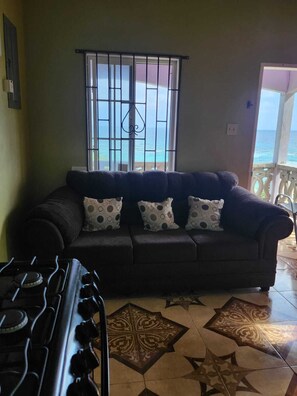 Living area - Ocean Sunrise Retreat in Long Bay, Portland Private 1 Bedroom Home with Balcony (Long Bay)