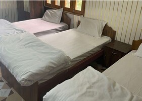 Habitación triple | Camas supletorias, wifi gratis, ropa de cama