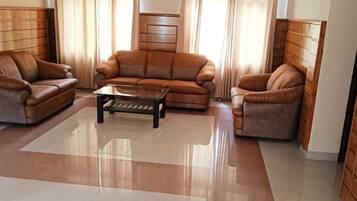 Deluxe Double Room, Balcony | Living area