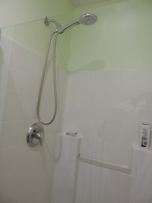 Shower, towels, soap, toilet paper