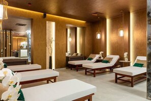 A spa room with wooden benches, white cushions, and hanging pendant lights. - Oasis Vista Escape With Terrace (Chișinău)