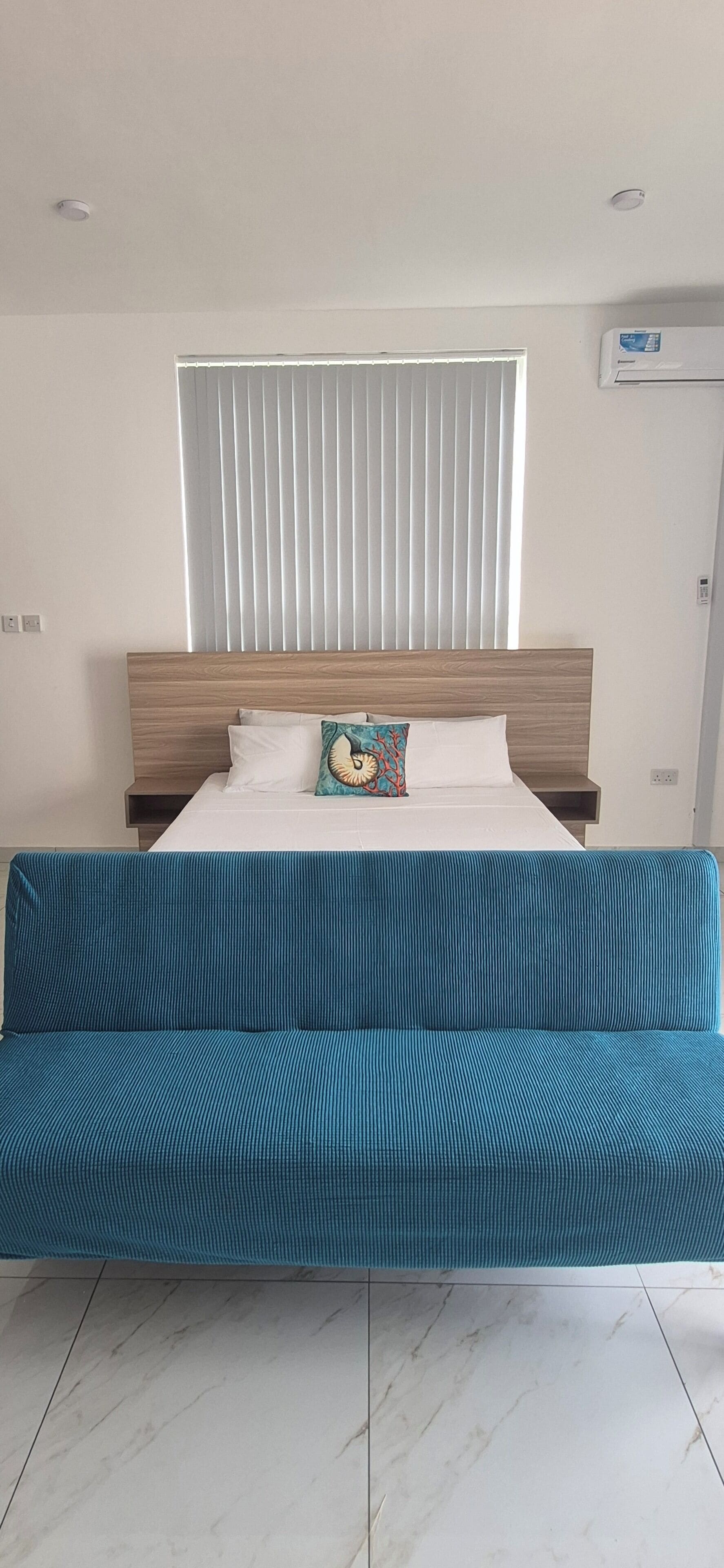 Apartment, Sea View | In-room safe, desk, laptop workspace, blackout drapes