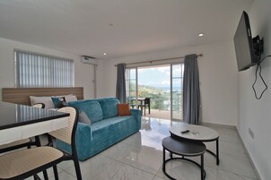 Studio Suite, Sea Facing | In-room safe, desk, laptop workspace, blackout drapes