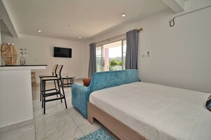 Studio Suite, Sea Facing | In-room safe, desk, laptop workspace, blackout drapes