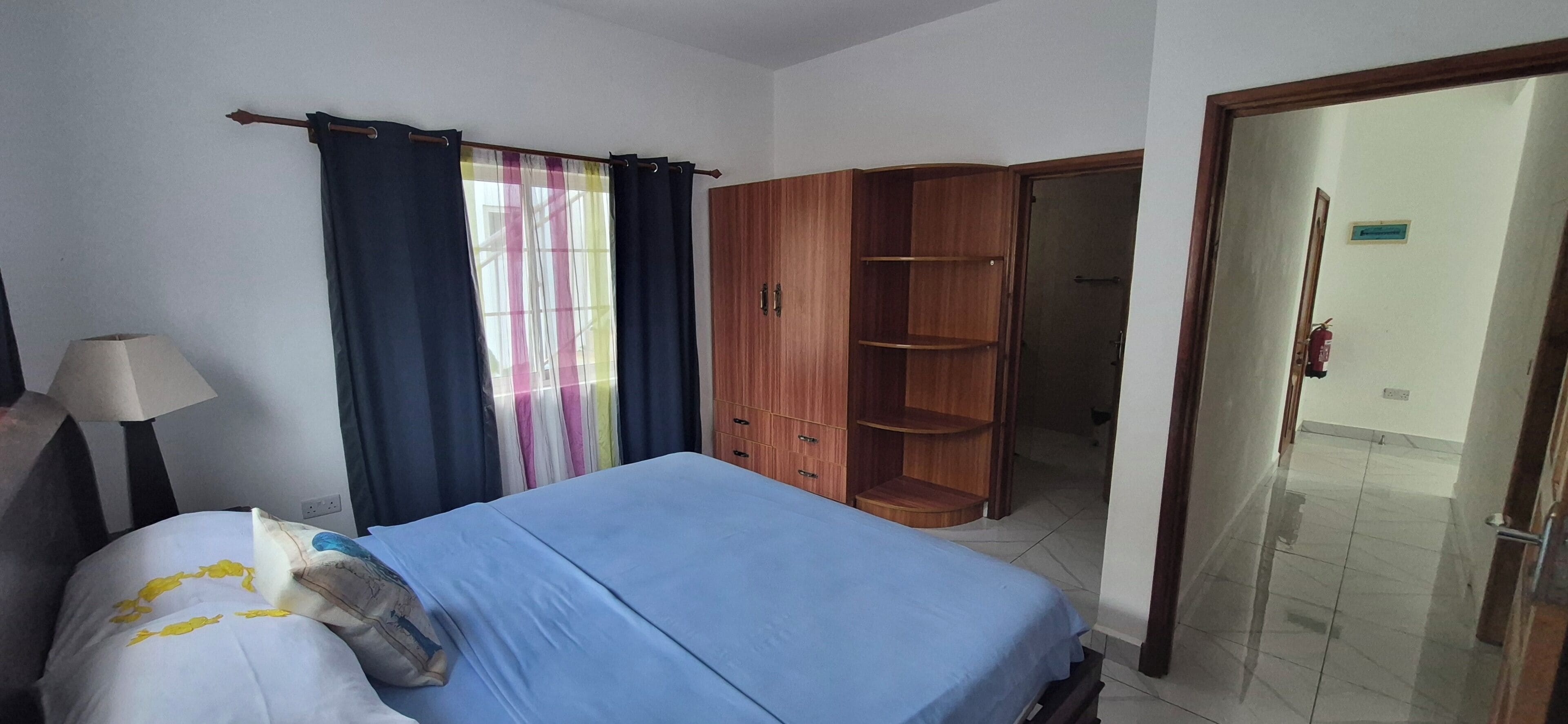 Family Apartment, Sea View | In-room safe, desk, laptop workspace, blackout drapes