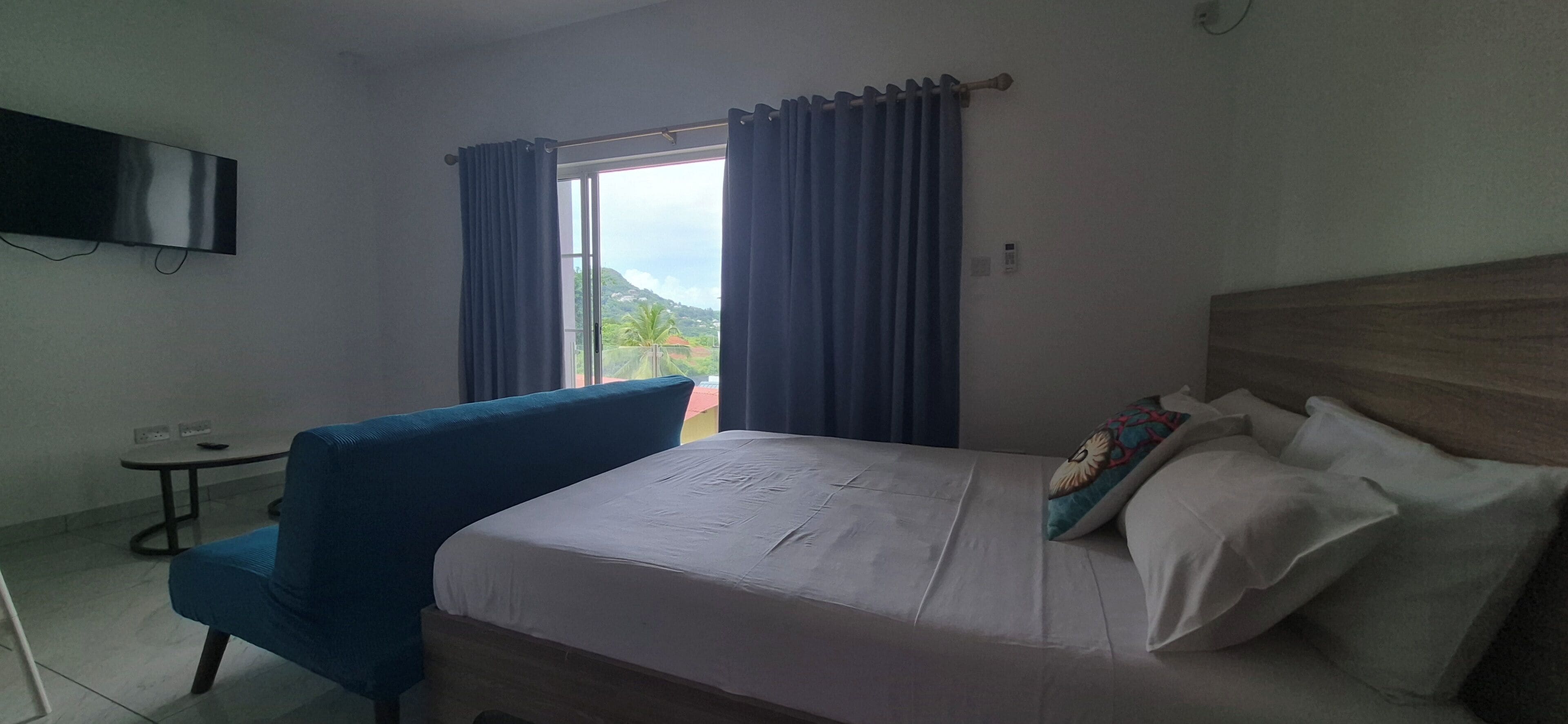 Apartment, Sea View | In-room safe, desk, laptop workspace, blackout drapes