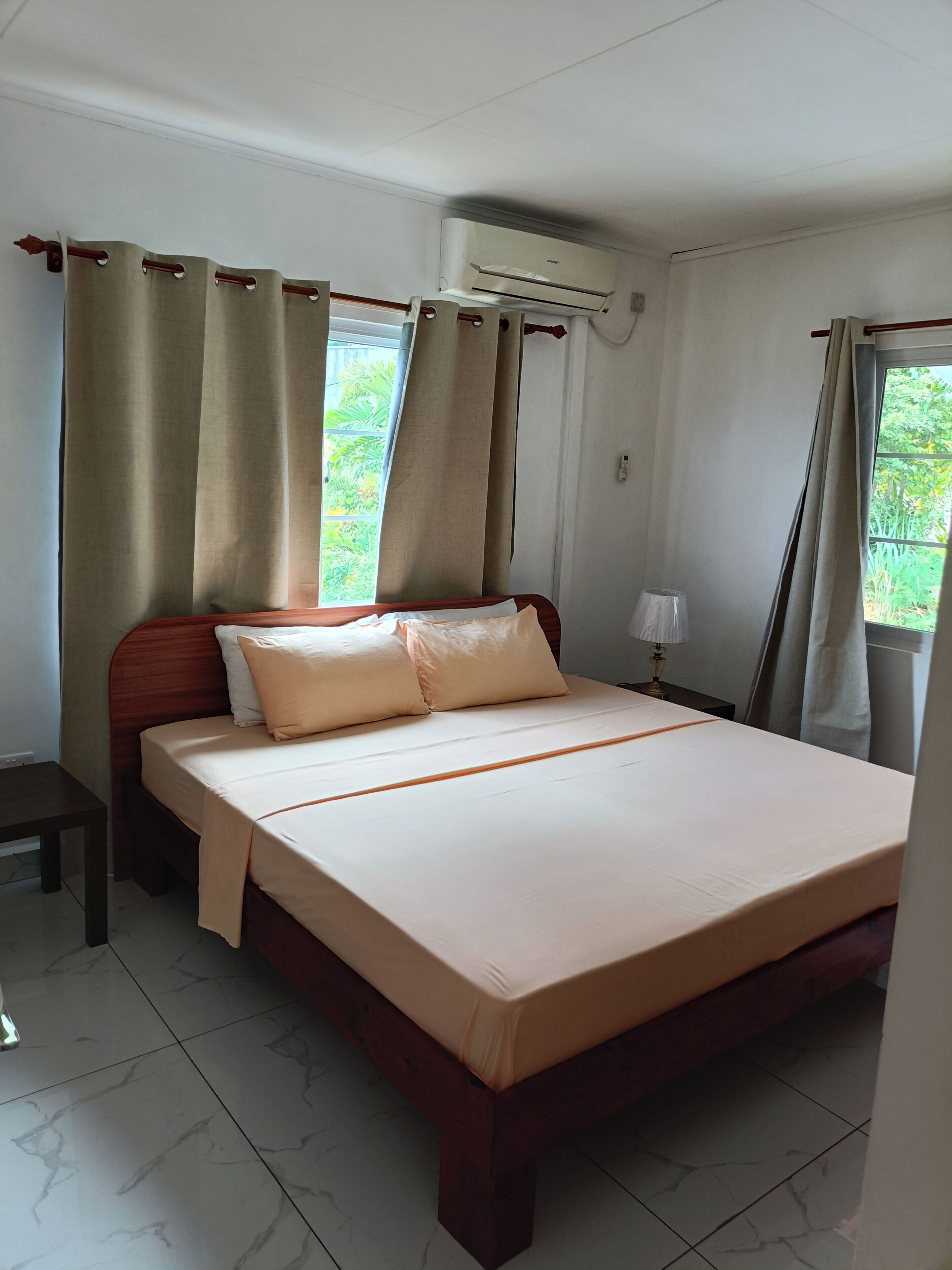 Family Apartment, Ocean View | In-room safe, desk, laptop workspace, blackout drapes