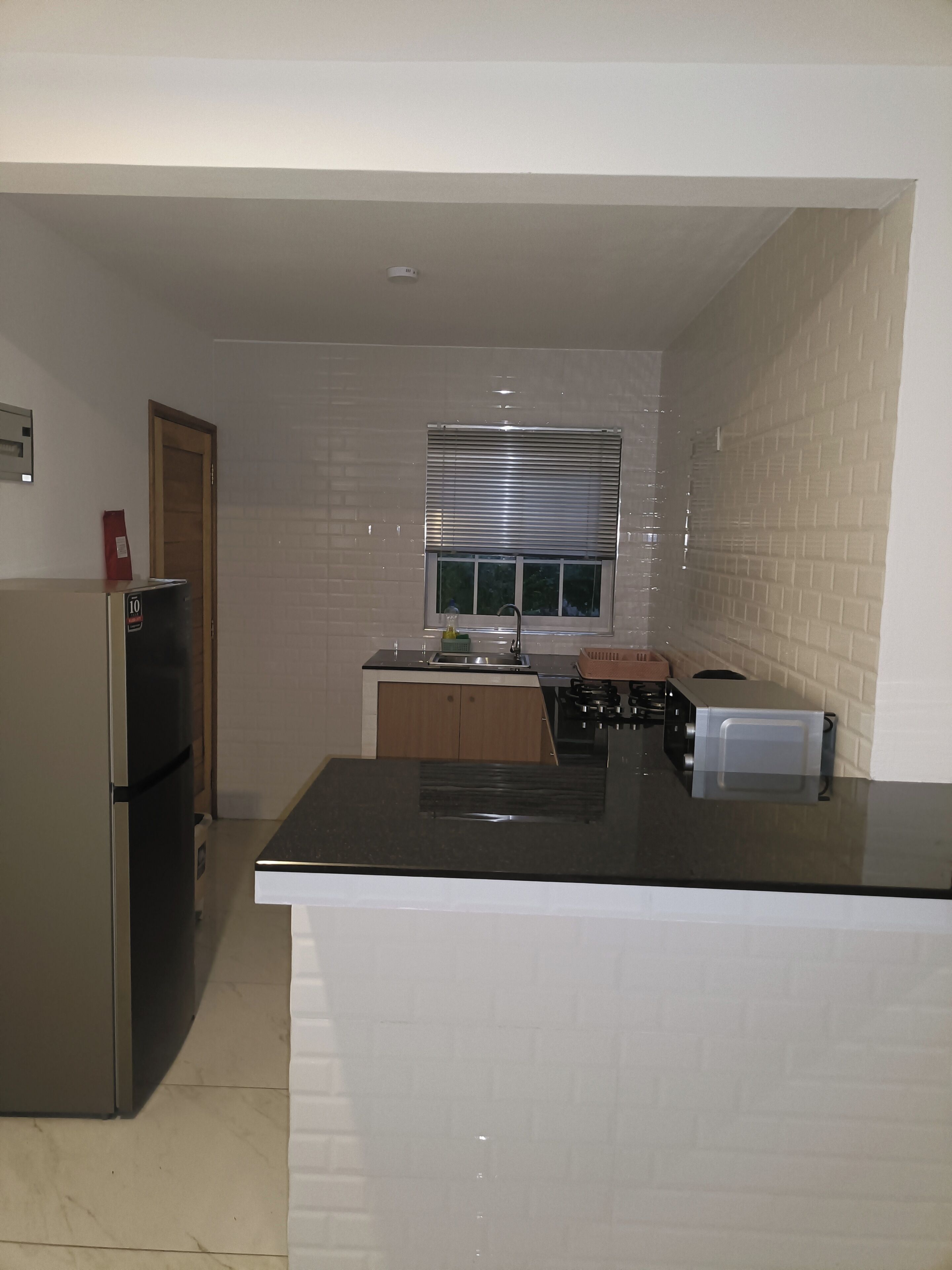 Appartamento, vista mare | Cucina privata | Frigorifero con congelatore, microonde, forno, piano cottura