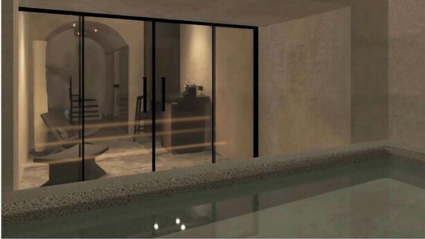 A modern interior with a glass partition, a pool, and a visible dining area. - Anemos Central Fira (Santorini)