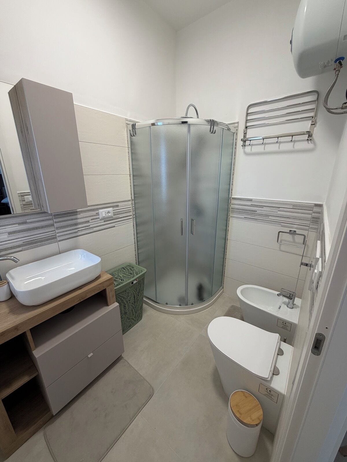 Shower, bidet, towels, soap