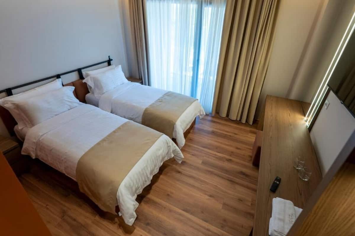Standard Double or Twin Room, Balcony, Courtyard View | In-room safe, desk, soundproofing, free WiFi