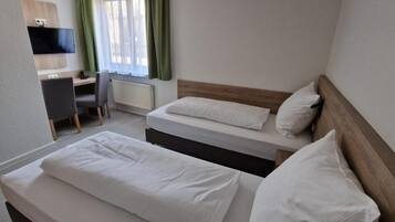 Double or Twin Room | Desk, iron/ironing board, travel crib, free WiFi