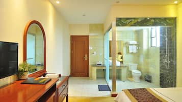 Shower, hair dryer, towels, shampoo
