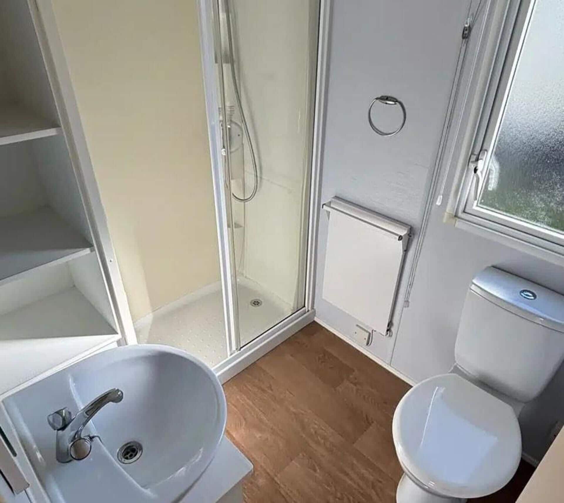 Separate bathtub and shower, deep-soaking bathtub, towels