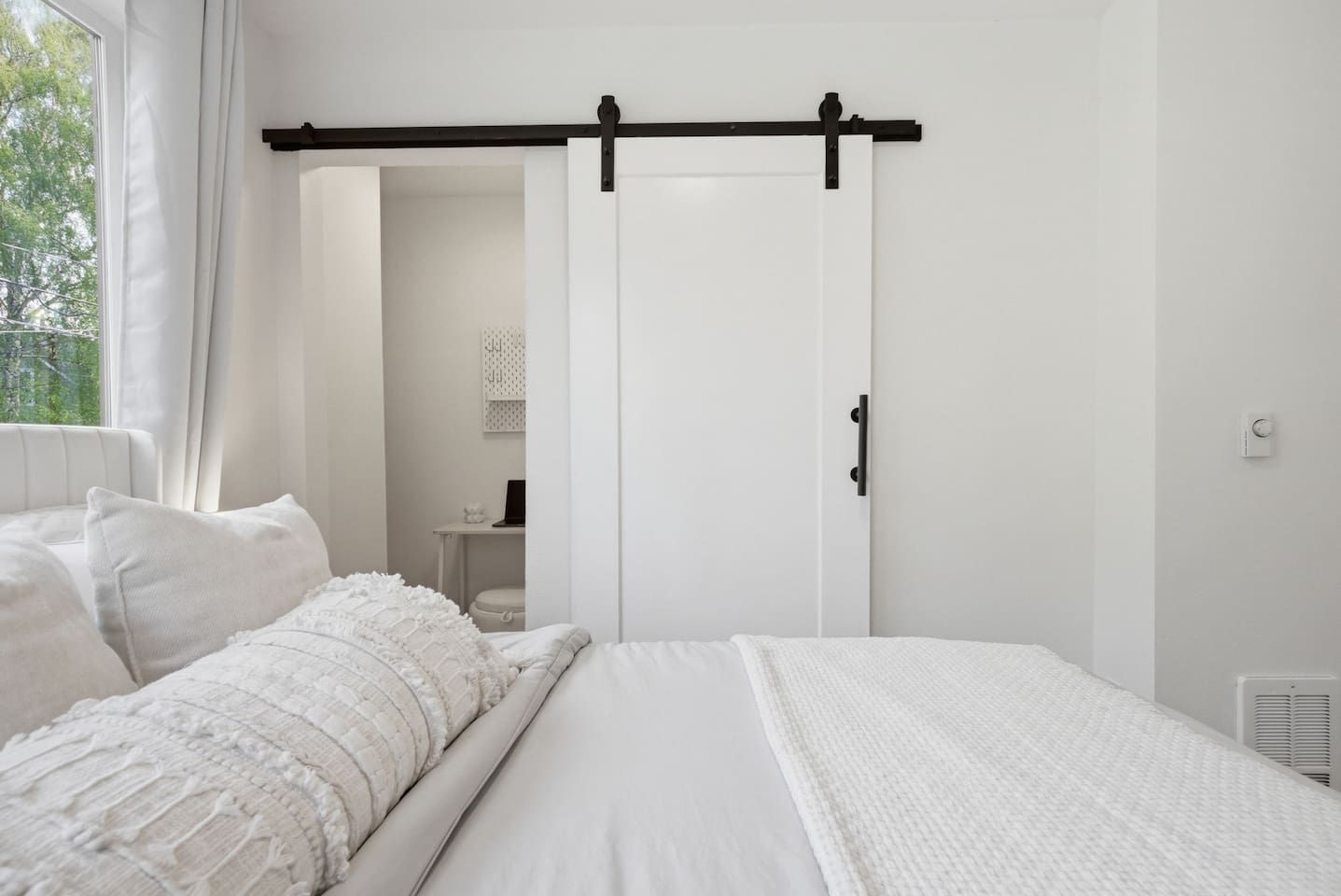 Queen bed with dedicated work space